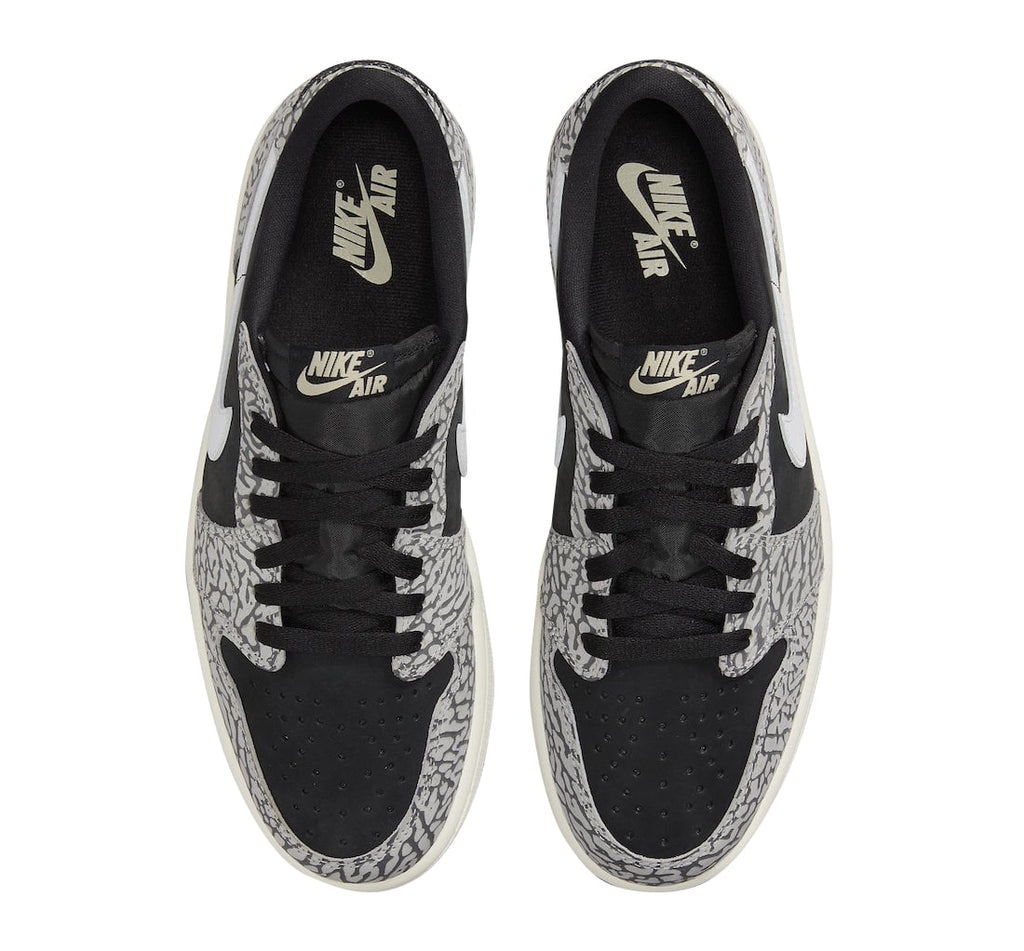 Air Jordan 1 Low OG Black Cement - Image 4